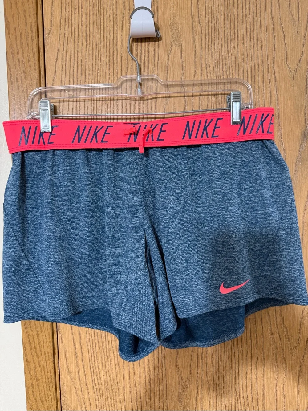 Nike Women's Heather Blue Athletic Shorts with Pink Swoosh